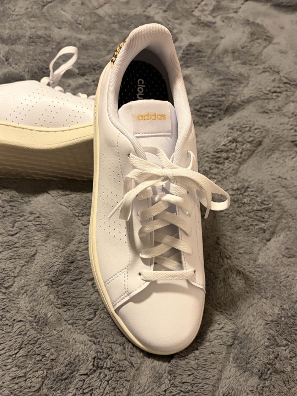 adidas Women’s White Sneakers with Gold Branding